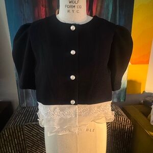 Elegant Black and White Women's Top with Pearl Buttons